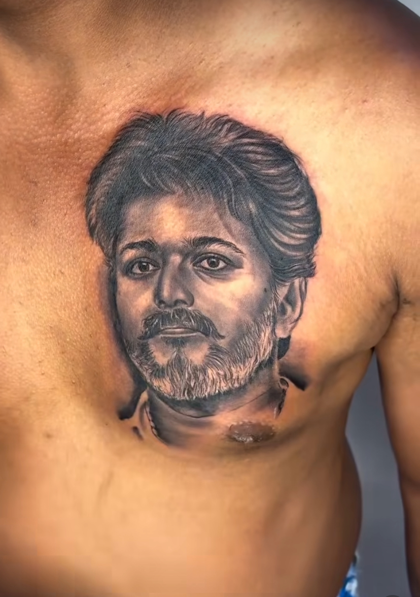 Hyper-realistic male portrait tattoo